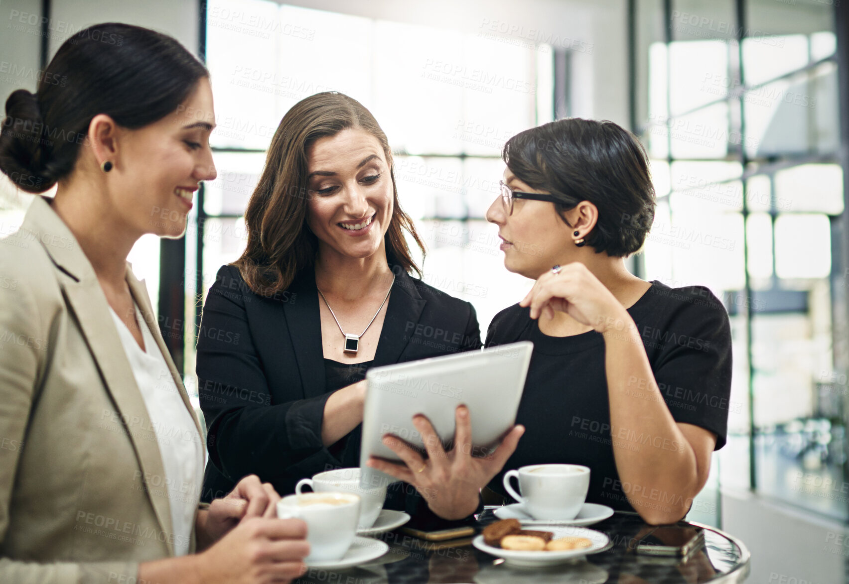 Buy stock photo Women, team and morning in office with tablet for daily business review or feedback and happy for online information. People, digital technology and excited for company growth or progress and results