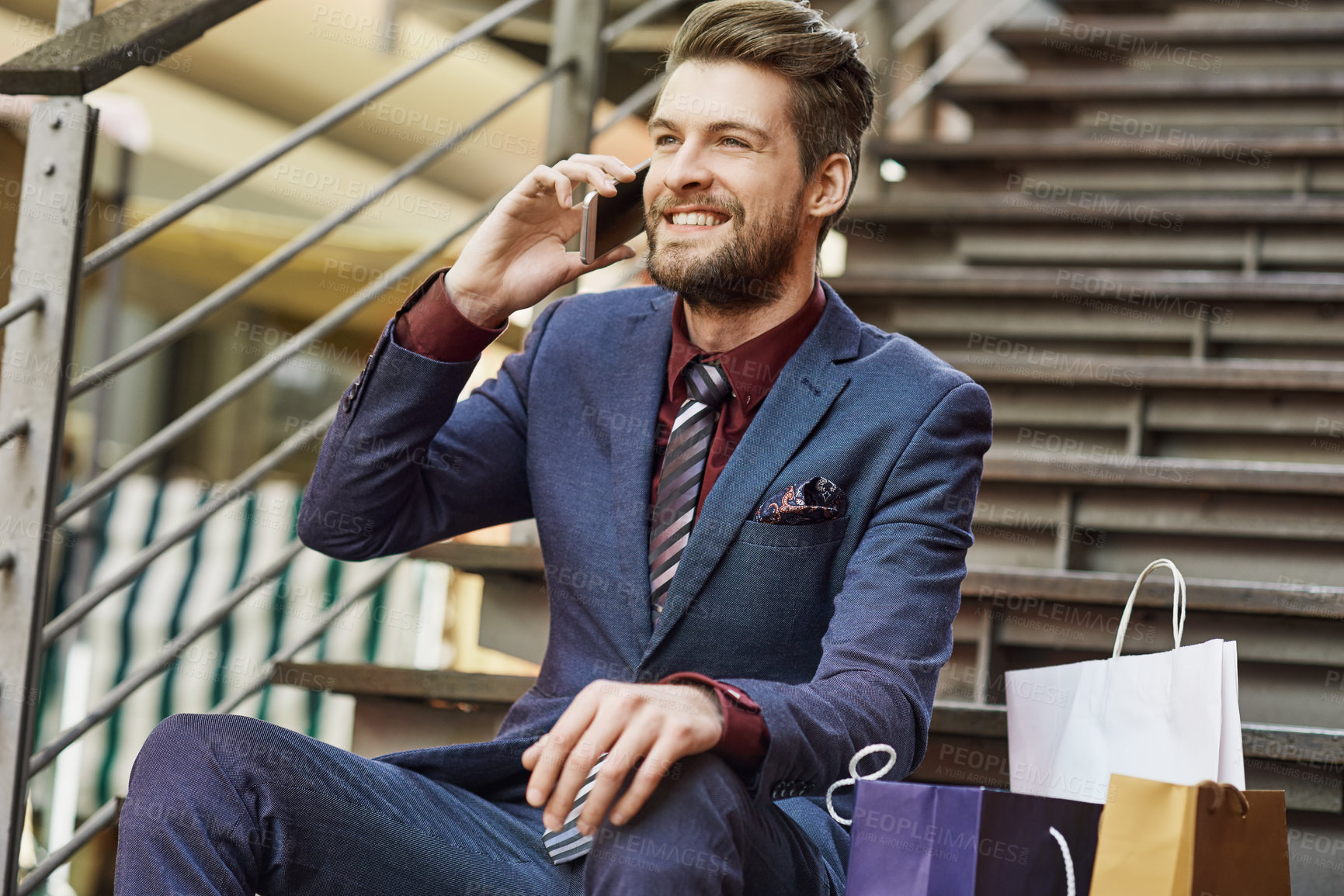 Buy stock photo Businessman, phone call and bags on steps for shopping break, relax and networking in city. Male person, mobile and conversation for customer, retail and corporate fashion on stairs in New York