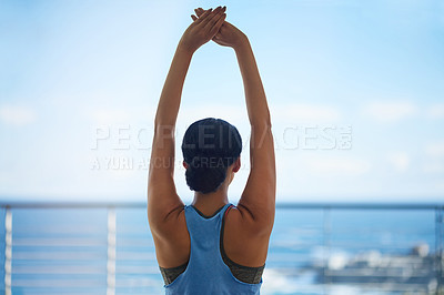 Buy stock photo Stretching, yoga and woman outdoor for exercise with balance, mindfulness and wellness routine. Fitness, nature and female person with pilates workout for arms on patio by ocean with health at home.