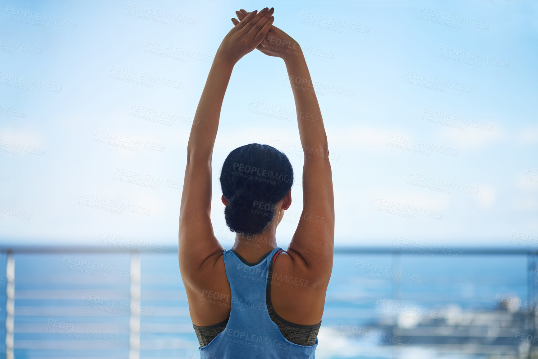 Buy stock photo Stretching, yoga and woman outdoor for exercise with balance, mindfulness and wellness routine. Fitness, nature and female person with pilates workout for arms on patio by ocean with health at home.