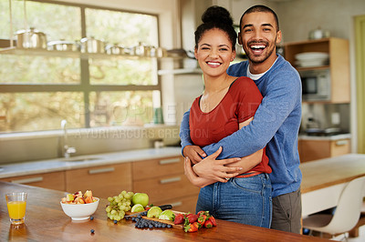 Buy stock photo Portrait, house and couple with smile, hug and peace with romance, relationship and bonding together. Kitchen, embrace or man with woman, nutrition or vegan breakfast with care, happiness or marriage