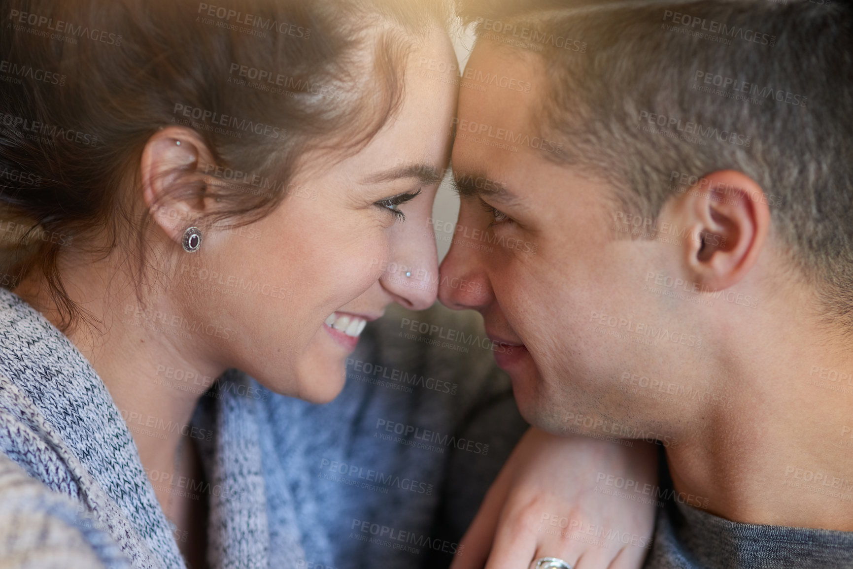 Buy stock photo Home, relax and nose of couple with smile for intimacy, affection and bonding together on weekend. Happy, man and woman with embrace in house for and support, commitment and love in healthy marriage