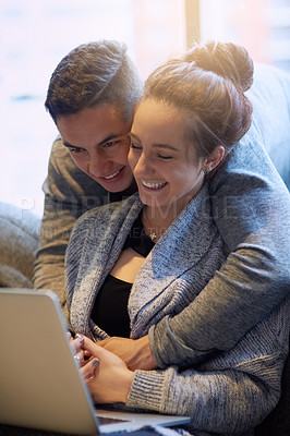 Buy stock photo Woman, happy and spouse relax at house together in living room with hug, bonding and love on weekend. Smile, couple man in relationship on break of laptop for streaming movie for entertainment