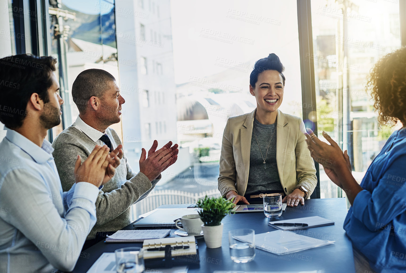 Buy stock photo Business woman, meeting and team with applause for presentation, conference or discussion at office. Female person or coach with young group of employees clapping for congratulations at workplace