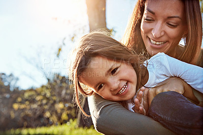 Buy stock photo Mom, hug and relax with child in garden, backyard or happiness in summer on vacation in park. Growth, mother and daughter smile together with games in countryside, nature or adventure in holiday