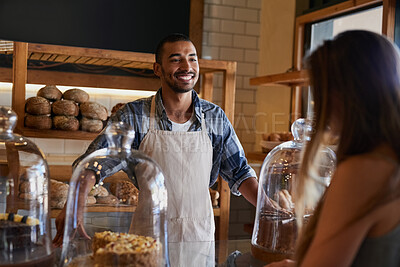 Buy stock photo Bakery, happy and man in cafe with customer for serving pastry, cakes and baked foods for small business. Restaurant, coffee shop and waiter or barista by counter for service, help and talk to woman