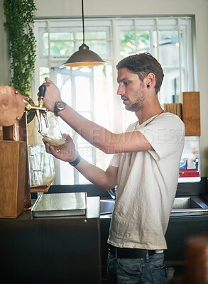 Buy stock photo Bartender, glass and pouring with beer from tap for order, service and alcohol at organic brewery. Person, barman and draft for hospitality, sale and discount for drinks at happy hour event in pub