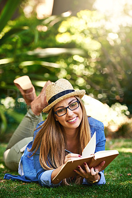 Buy stock photo Park, girl and portrait with book for reading, learning and knowledge with smile outdoor. Nature, female student and novel for entertainment, romance and English literature for language improvement