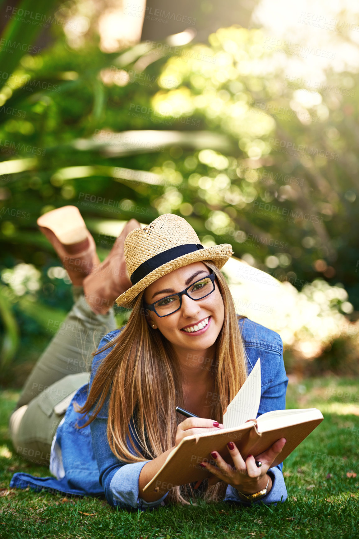 Buy stock photo Park, girl and portrait with book for reading, learning and knowledge with smile outdoor. Nature, female student and novel for entertainment, romance and English literature for language improvement