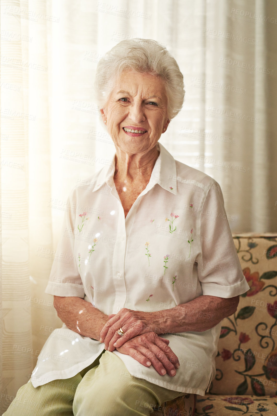 Buy stock photo Happy, sofa and portrait of senior woman in retirement home with cheerful, joy and smile in house. Window, living room and elderly person on weekend with confidence, calm and relaxing in morning