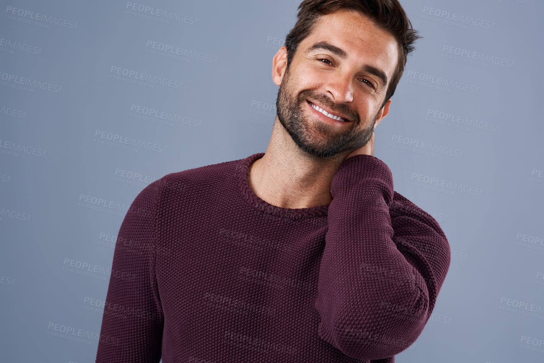 Buy stock photo Studio, relax and smile of man, fashion and confidence in mockup space, pride and cardigan in winter. Blue background, portrait and person in Miami, happy and comfortable in clothes, joy and jersey