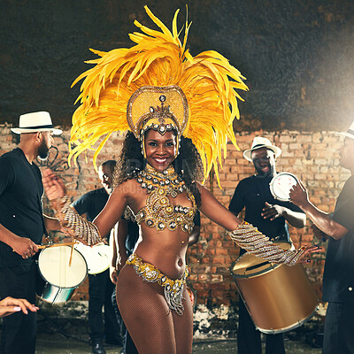 Buy stock photo Samba, dance and black woman at Carnival to celebrate, night energy and holiday party in Rio de Janeiro, Brazil. Street band, music smile and portrait of a dancer at an outdoor festival dancing