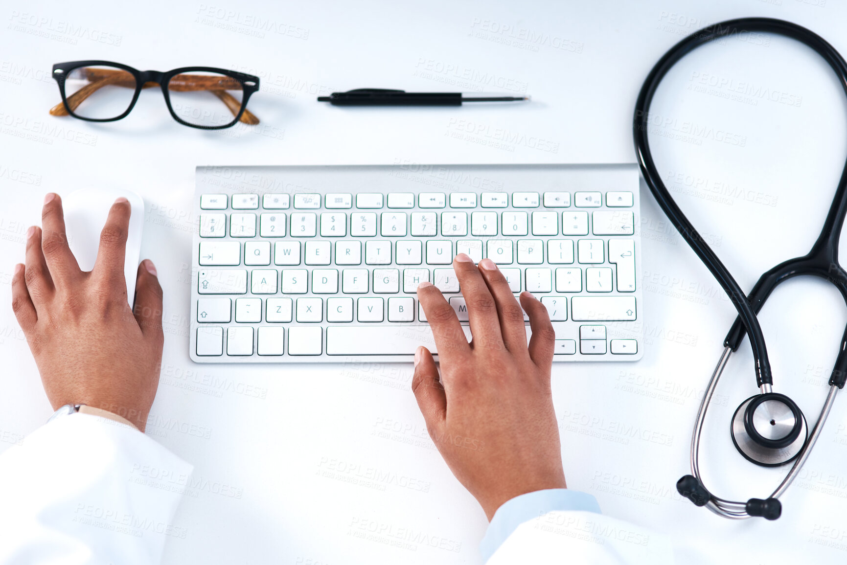 Buy stock photo Hands, keyboard and healthcare research in lab with top view or stethoscope for cardiology, study or online. Person, fingers and medical science or education learning or virus exam, trail or planning