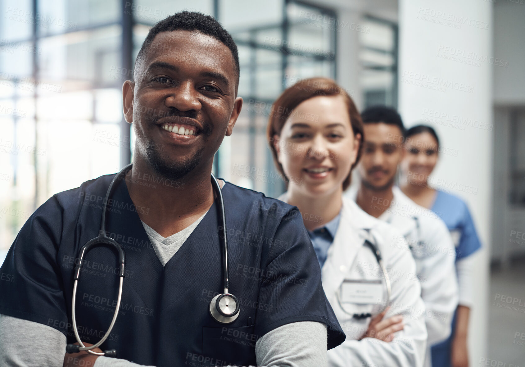 Buy stock photo Doctors, man and arms crossed with smile, team or portrait for diversity in medical career at hospital. Surgeon group, people and women with collaboration, wellness and pride for healthcare services
