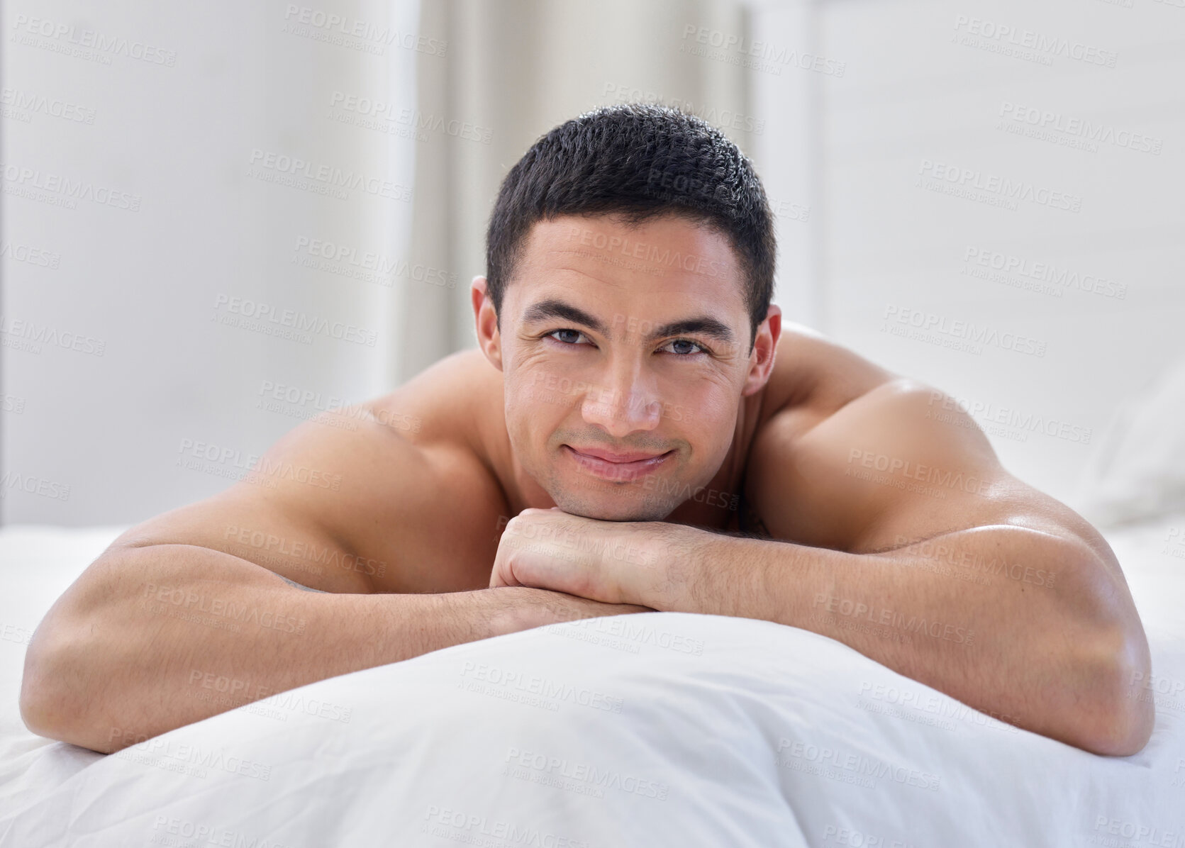 Buy stock photo Bedroom, portrait and man with smile, shirtless and relax on bed, happy and thinking in morning. Home, muscle and fitness of body and person in apartment, confidence and tattoo on arm in house