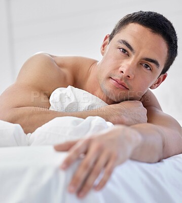 Buy stock photo Shirtless, portrait and man in bedroom, serious and relax on bed, happy and peace of good sleep in morning. Home, lazy and calm for rest, wake up and comfort on mattress in apartment with person