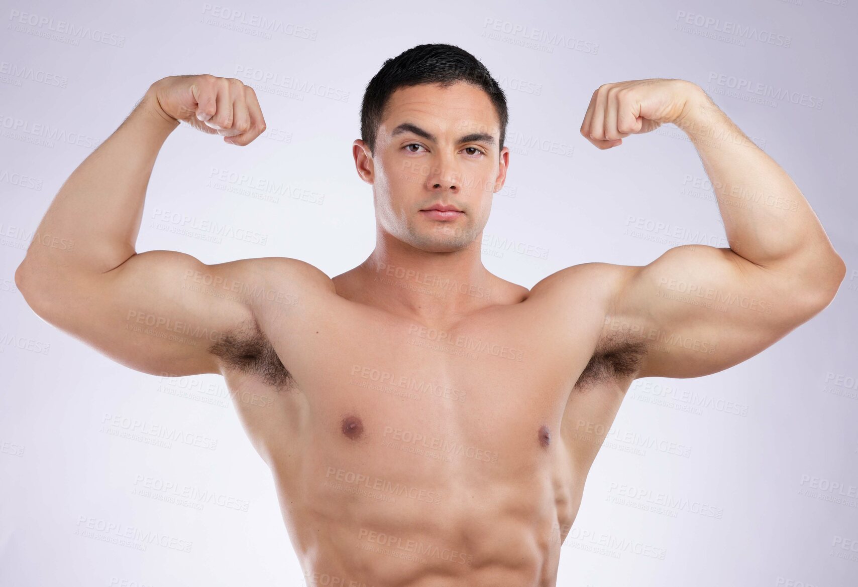 Buy stock photo Portrait, muscle and man flex body for health, wellness or fitness in studio isolated on white background. Face, strong bodybuilder and show bicep for exercise, workout or serious for sports training