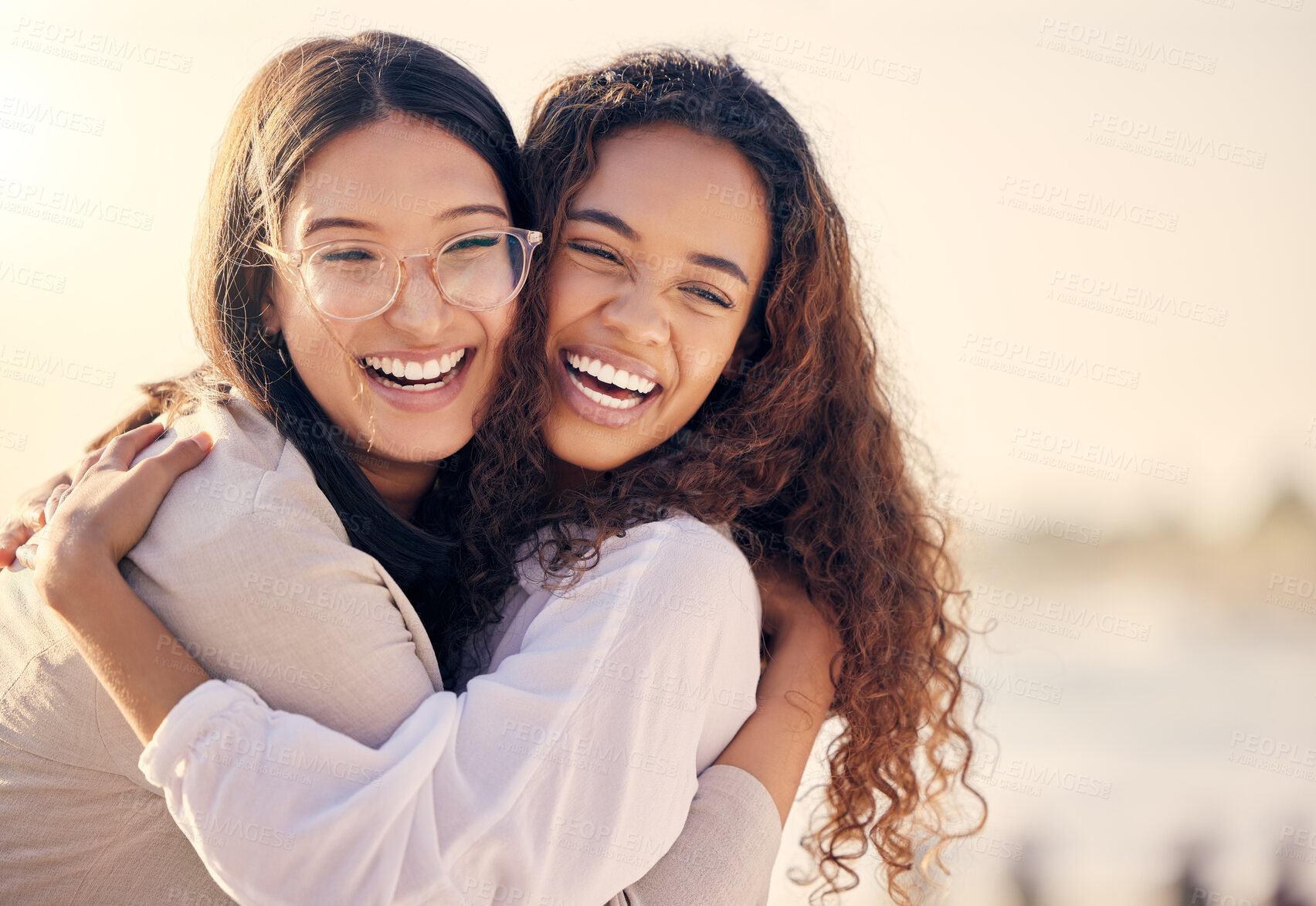 Buy stock photo Lesbian, hug and laugh in outdoor for love, travel and comedy for bonding or funny humor. Couple, happy and embrace in nature on vacation or holiday, romance and lgbt marriage or relationship on trip