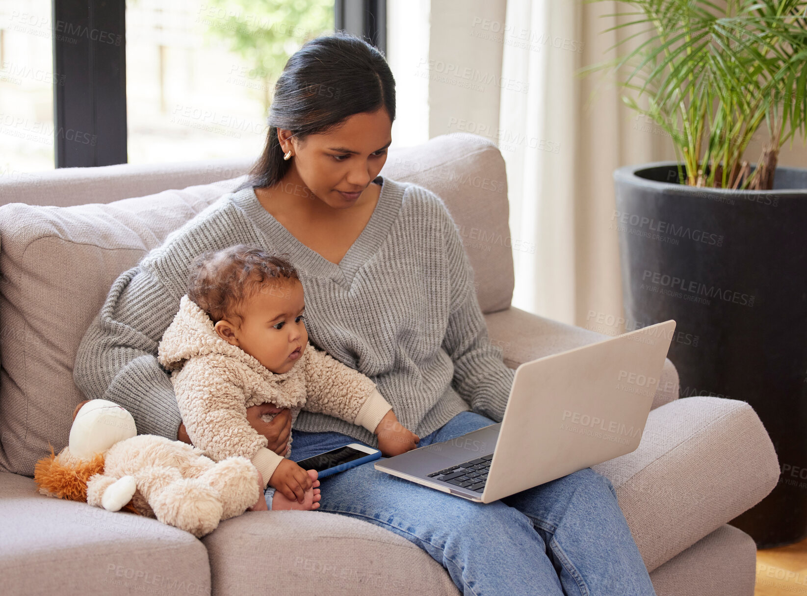 Buy stock photo Woman, laptop and baby on sofa for maternity leave, remote work and streaming in living room. Young child, mother and computer on couch for studying, entertainment or research in house on internet