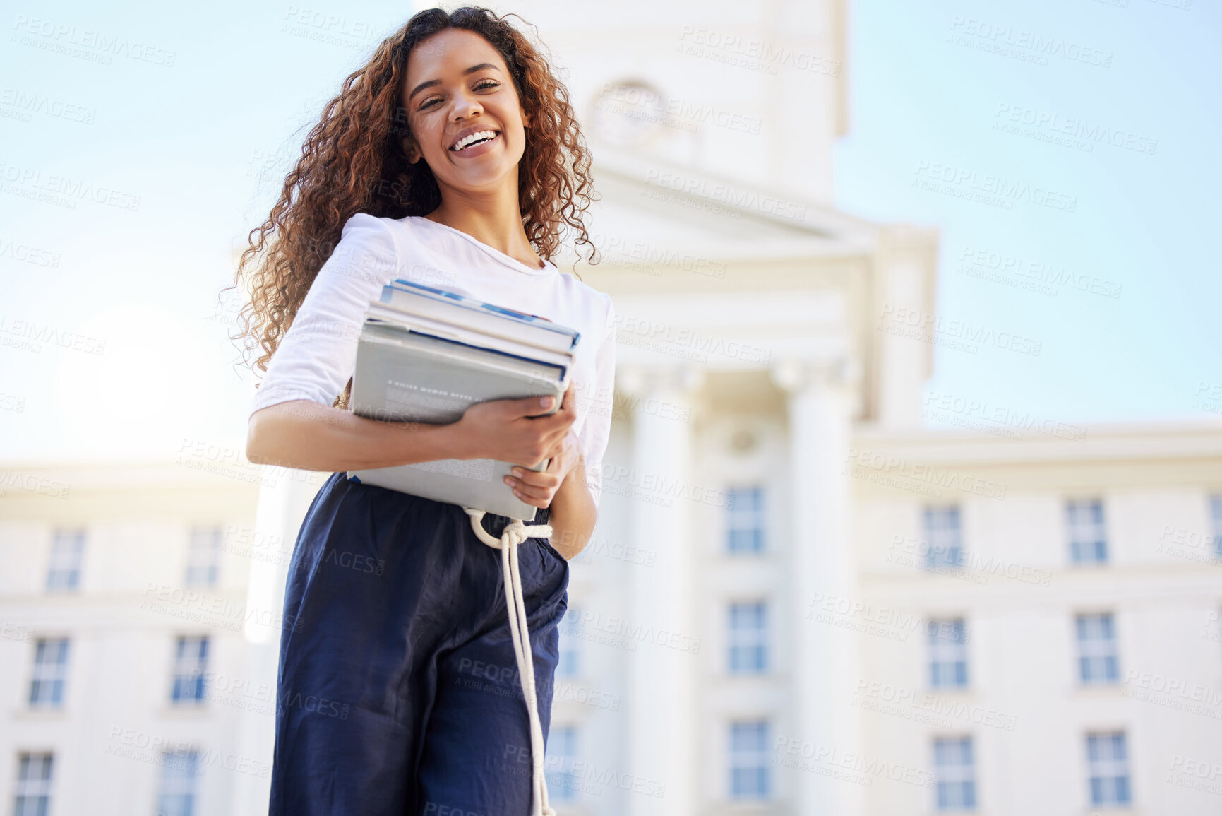 Buy stock photo University student, girl and books in portrait, smile and outdoor for research, studying and education at academy. Woman, person and happy with textbook, scholarship and learning at college campus