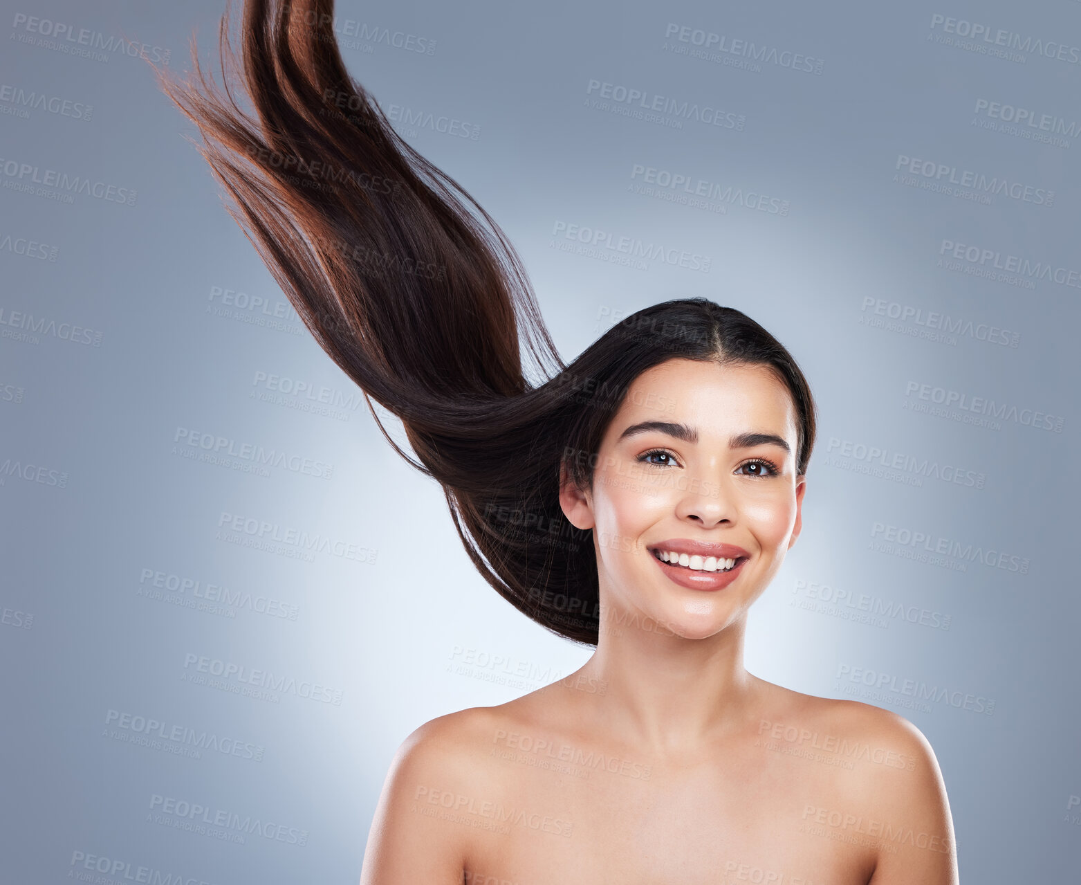 Buy stock photo Happy, wind and portrait of woman with hair care in studio with natural, beauty and salon treatment. Smile, health and female person with shampoo shine for silky hairstyle isolated by gray background