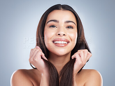 Buy stock photo Studio shot of a beautiful young woman with healthy brown hair