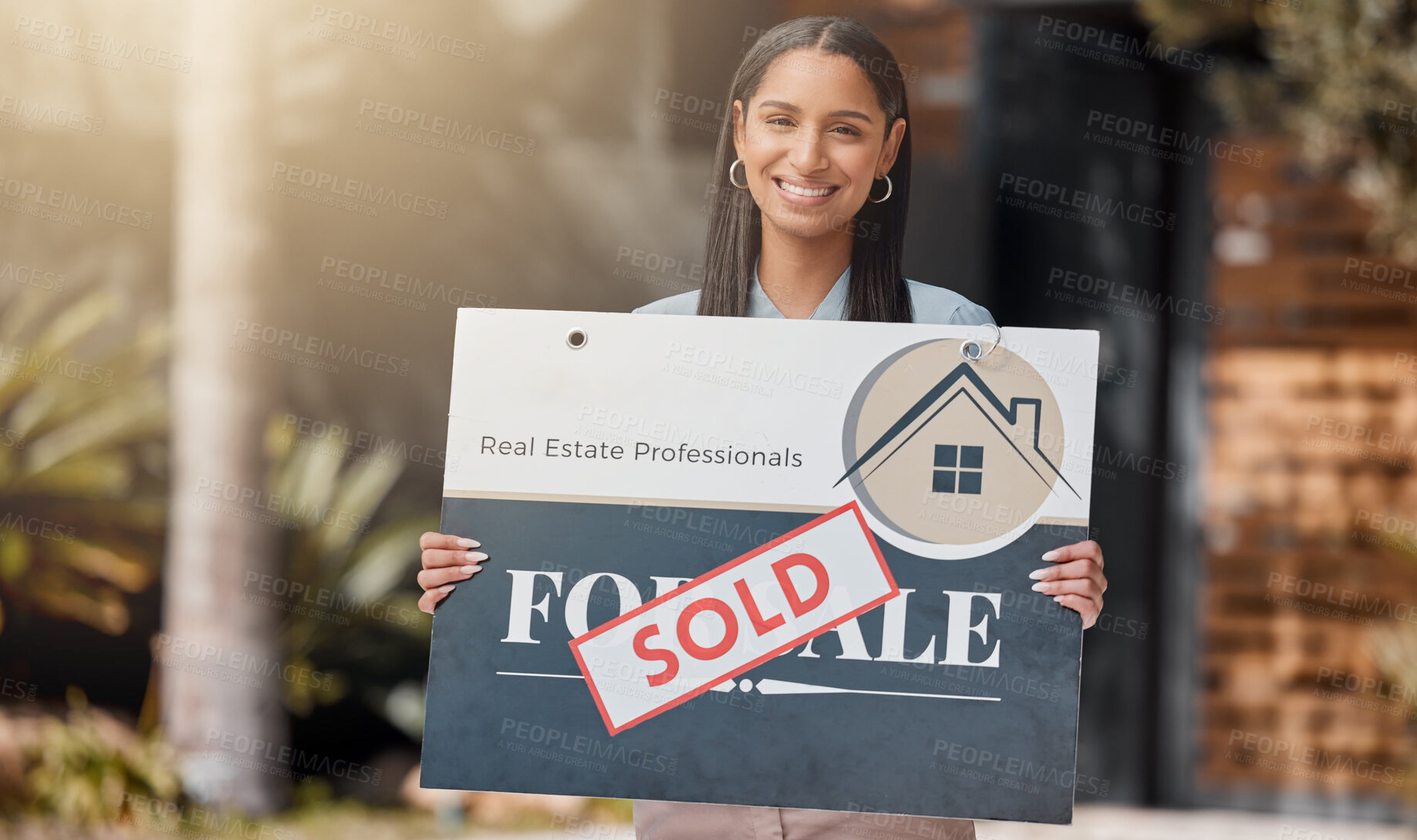 Buy stock photo Property, sold sign and portrait of realtor woman in garden of home for bond, loan or mortgage. Board, real estate and sale with happy estate agent in neighborhood for finance, growth or investment