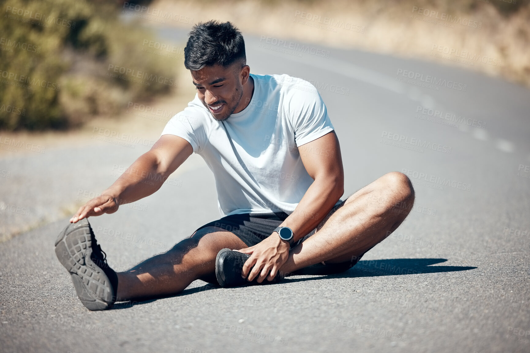 Buy stock photo Happy man, fitness and stretching body on road for running, cardio workout or exercise outdoors. Fit, active or sporty male person, athlete or runner in warm up leg stretch for training on street
