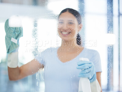 Buy stock photo Happy woman, cleaner and window with spray bottle for disinfection, hygiene or health and safety at office. Female person, domestic or young maid with smile for glass, surface or cleaning service