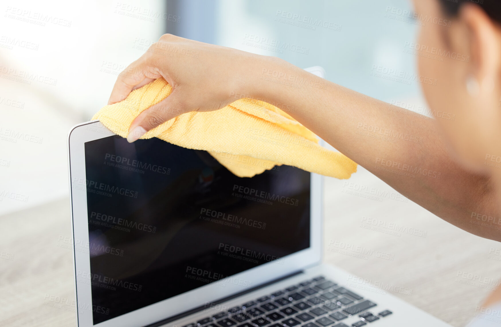 Buy stock photo Woman, hands and cleaning with laptop for dust, dirt or bacteria or germ removal on desk at office. Mockup of female person or employee wiping equipment or computer for sanitizing or disinfection