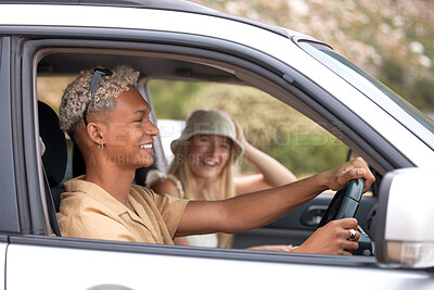 Buy stock photo Interracial couple, road trip and car for vacation, happy and outdoor in countryside for summer adventure. Man, woman and driving with smile, journey and transport for holiday by window on highway
