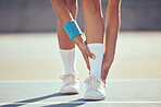 Tennis athlete with ankle injury, pain and hurt on a court after training, workout or practice outdoor. Professional sport person with accident after fitness exercise, game or match at a sports club