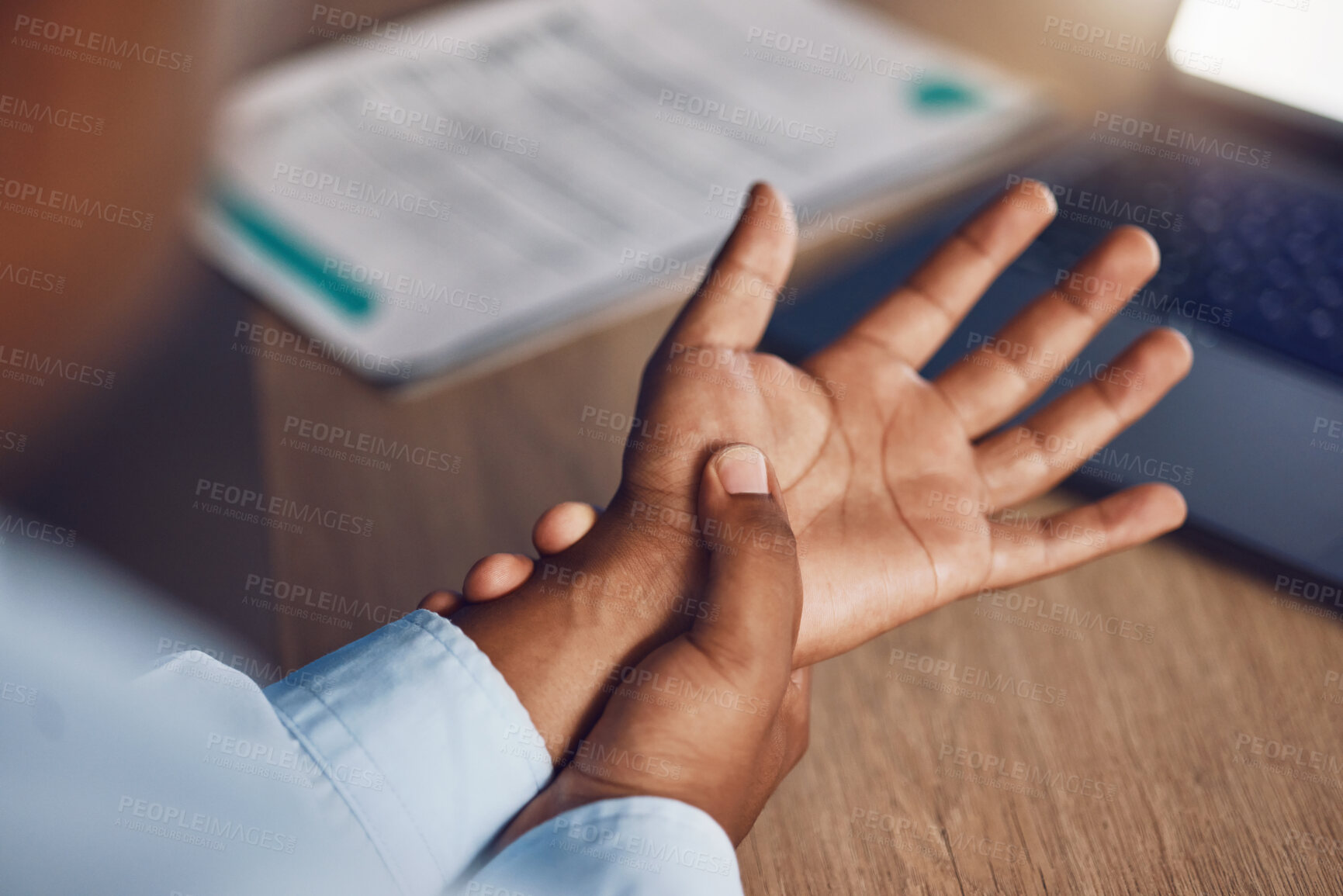 Buy stock photo Hand, pain and businessman in office with anatomy, risk or fibromyalgia stress, disaster and carpal tunnel discomfort from above. Wrist, injury and entrepreneur with palm massage for laptop strain