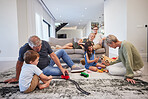 Family care, children love and grandparents happy with toys in living room with kids, smile train game and teddy bear in house. Mother and father relax on couch with elderly people and sibling games