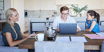 Buy stock photo Family working at a kitchen table, doing homework at home with young man and woman on laptop next to their child. A girl playing while her parents online or remote working in quarantine at home