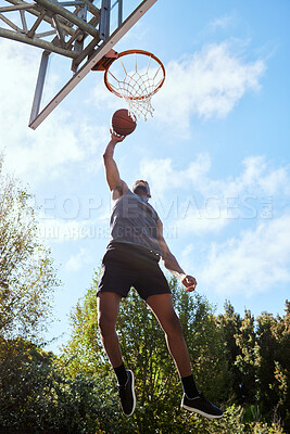 Buy stock photo Basketball, black man and shooting, athlete and fitness, playing sports on outdoor basketball court and jumping. Active, exercise and sport with muscle, strong and training with workout in nature.