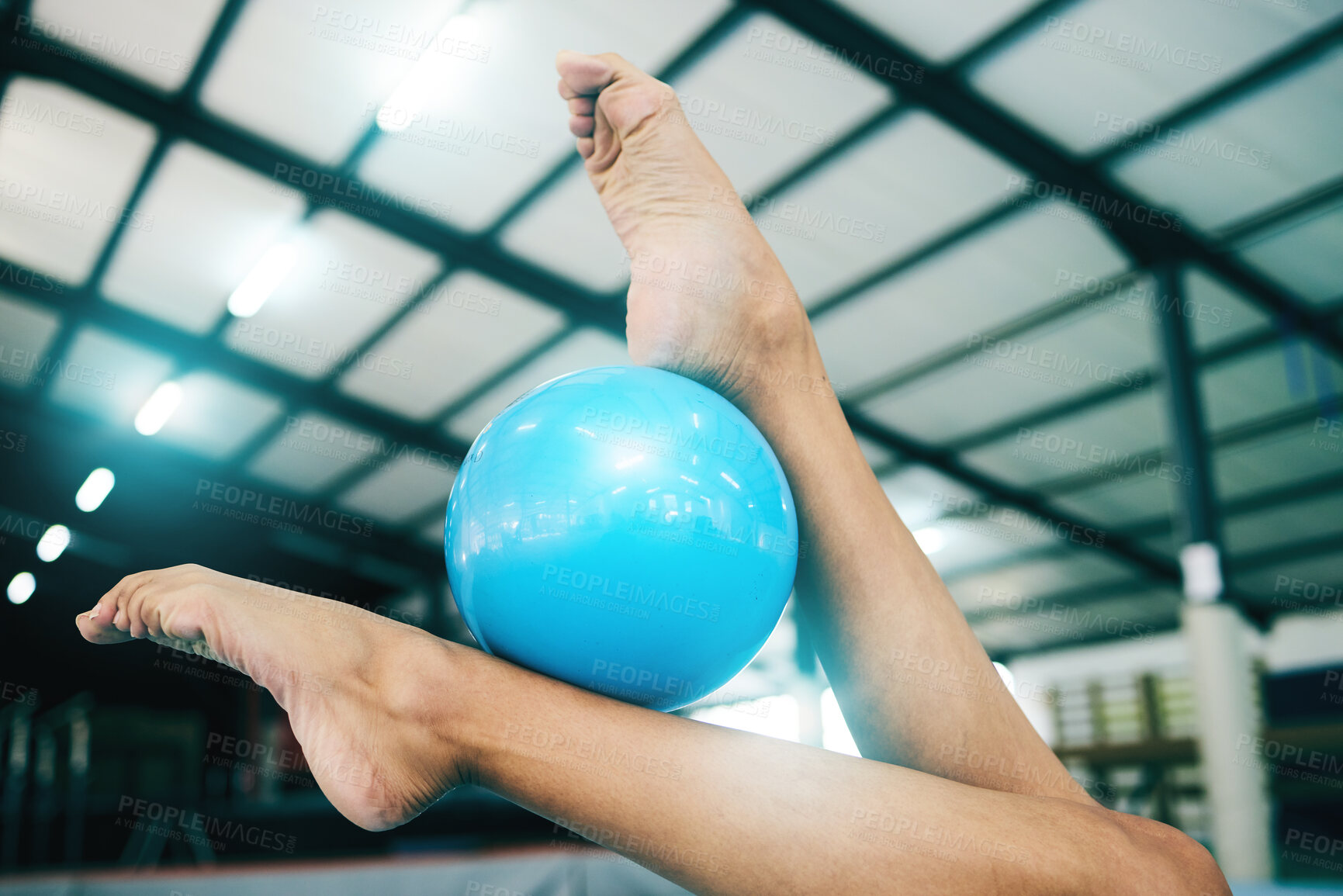 Buy stock photo Feet, gymnastics and woman with ball for competition, practice or event training. Closeup and barefoot female gymnast balance equipment with agility, exercise and performance in sports arena