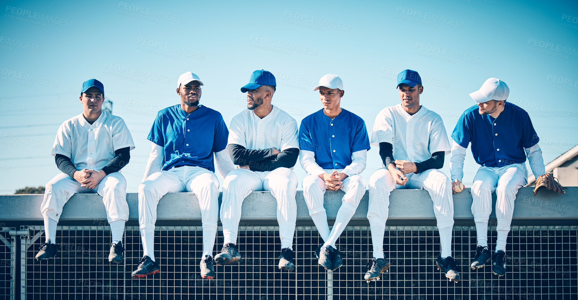 Buy stock photo Baseball team, sport athlete communication and men fitness sitting to relax before softball game. Sports, diversity and friends group together in a stadium ready for exercise, training and teamwork