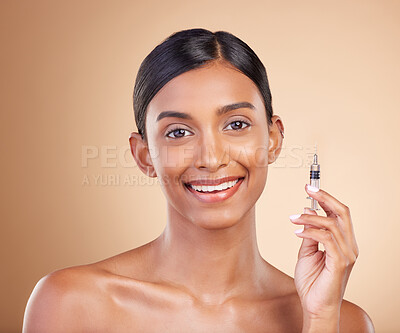 Buy stock photo Face, skincare and woman with injection in studio isolated on a brown background. Portrait, dermatology filler and happy Indian model with prp syringe cosmetics for anti aging, beauty or health