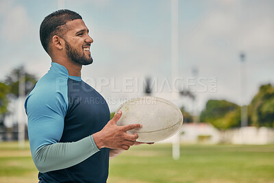 Buy stock photo Rugby, field and happy man with ball, confidence and pride in winning competition game. Fitness, sports and happiness, professional player with smile, ready for match and workout on grass at stadium.