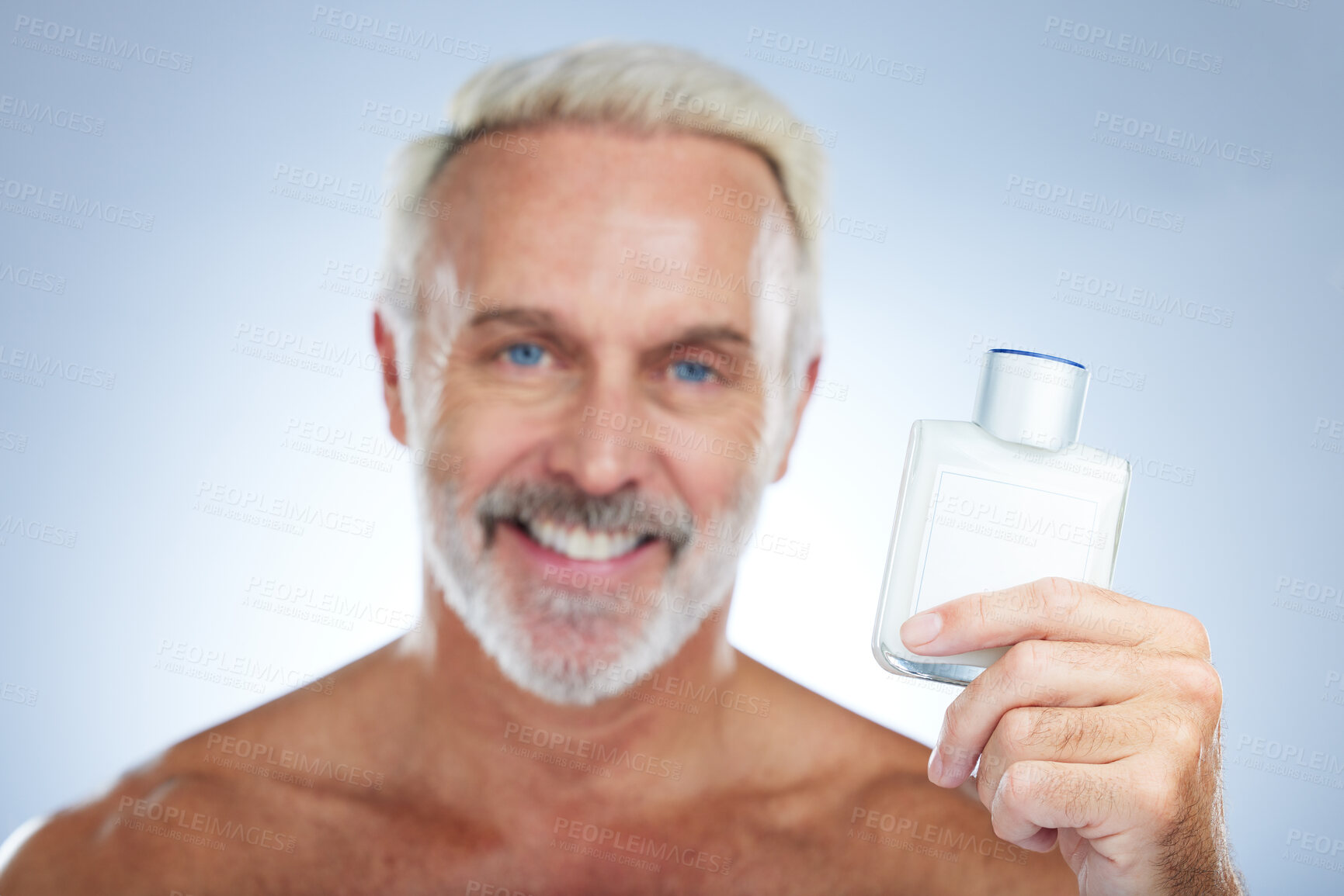 Buy stock photo Old man, cologne aftershave and portrait in a studio with perfume and spray bottle product with a smile. Isolated, grey background and happiness of a senior and elderly model with beauty routine 