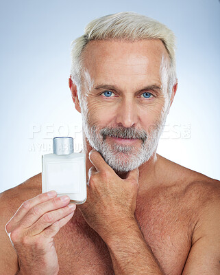 Buy stock photo Old man, portrait and confident, face with cologne and grooming, hygiene and parfum product on studio background. Perfume, fresh fragrance and anti aging cosmetic care, senior male and skincare