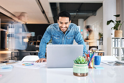 Buy stock photo Laptop, happy and asian business man in office positive results, report or feedback, reading or email. Smile, good news and male designer online for creative, inspiration or idea in coworking space