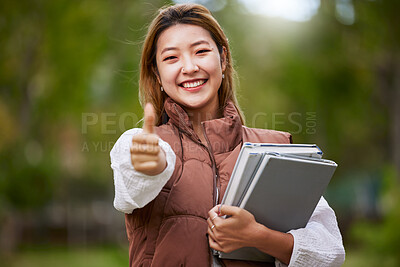 Buy stock photo Student, thumbs up and portrait of woman with books for learning, education and outdoor on university campus with happiness or pride. Happy, face and girl in college with notebook or walking to class