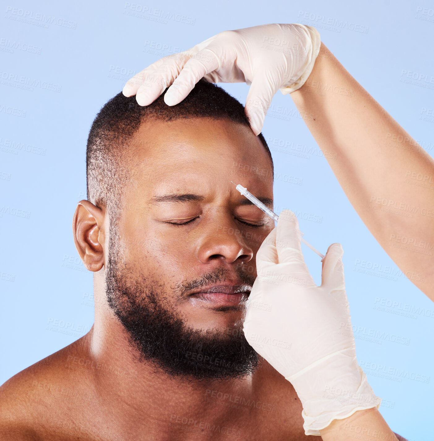 Buy stock photo Black man, plastic surgery and syringe in studio for beauty, anti-aging or facial transformation by background. African patient, model and medic hands for dermatology, needle or fillers for aesthetic