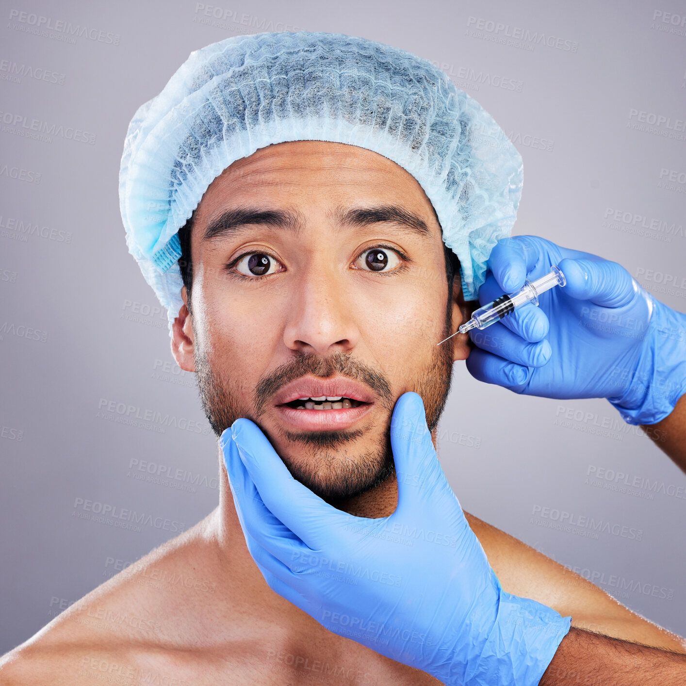 Buy stock photo Hands, portrait and plastic surgery with a man in studio on a gray background for injection. Face, beauty and transformation with a male customer in a clinic for antiaging filler or cosmetics