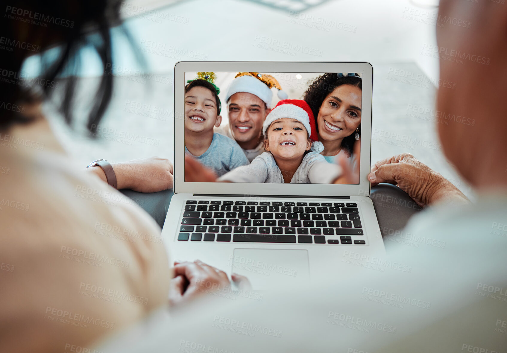 Buy stock photo Christmas, family and video call on laptop in portrait, happy and communication. Xmas, computer and kids with parents in online chat for celebration of holiday in virtual webinar with face of couple