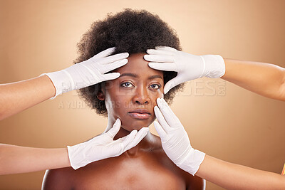 Buy stock photo Skincare, hands and portrait of a black woman for plastic surgery or face inspection. Medical, African person and doctors touching for facial check or dermatology on a studio background