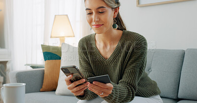 Buy stock photo Happy woman relax on sofa with phone, credit card and banking for ecommerce on social media store in home. Online shopping, payment or digital app, girl with smile in living room and budget in house.