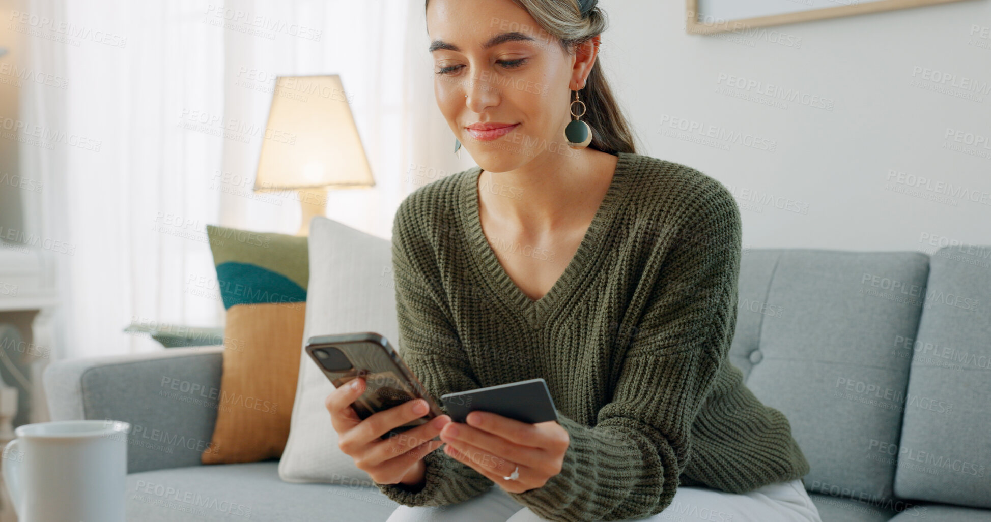 Buy stock photo Happy woman relax on sofa with phone, credit card and banking for ecommerce on social media store in home. Online shopping, payment or digital app, girl with smile in living room and budget in house.